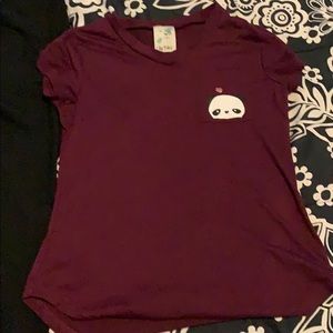 A purple short sleeve shirt.